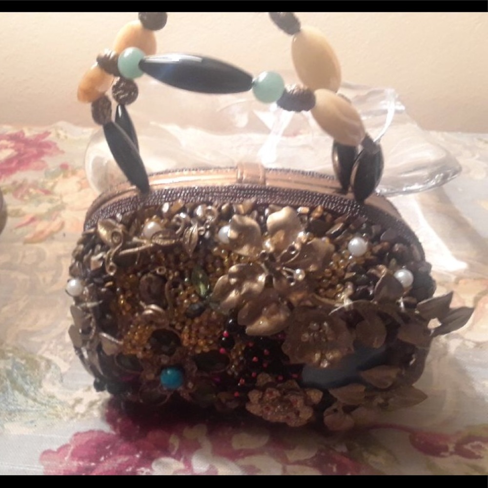 Clutch purse encrusted with multi stones